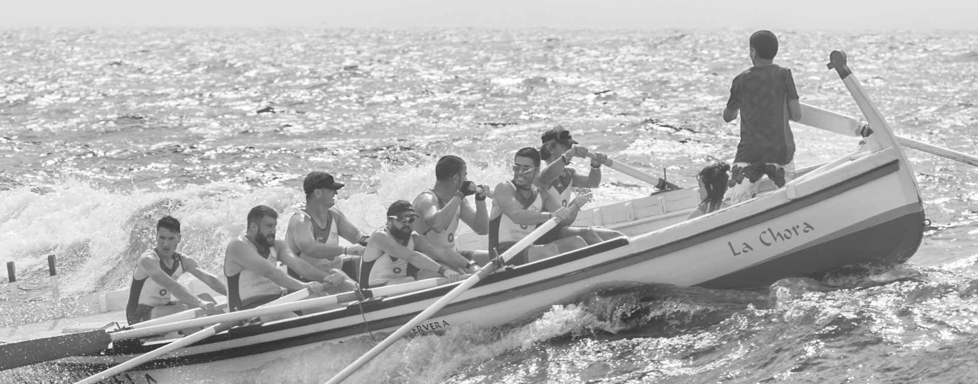 Value-passion-seven-men-in-rowing-boat-with-helmsman