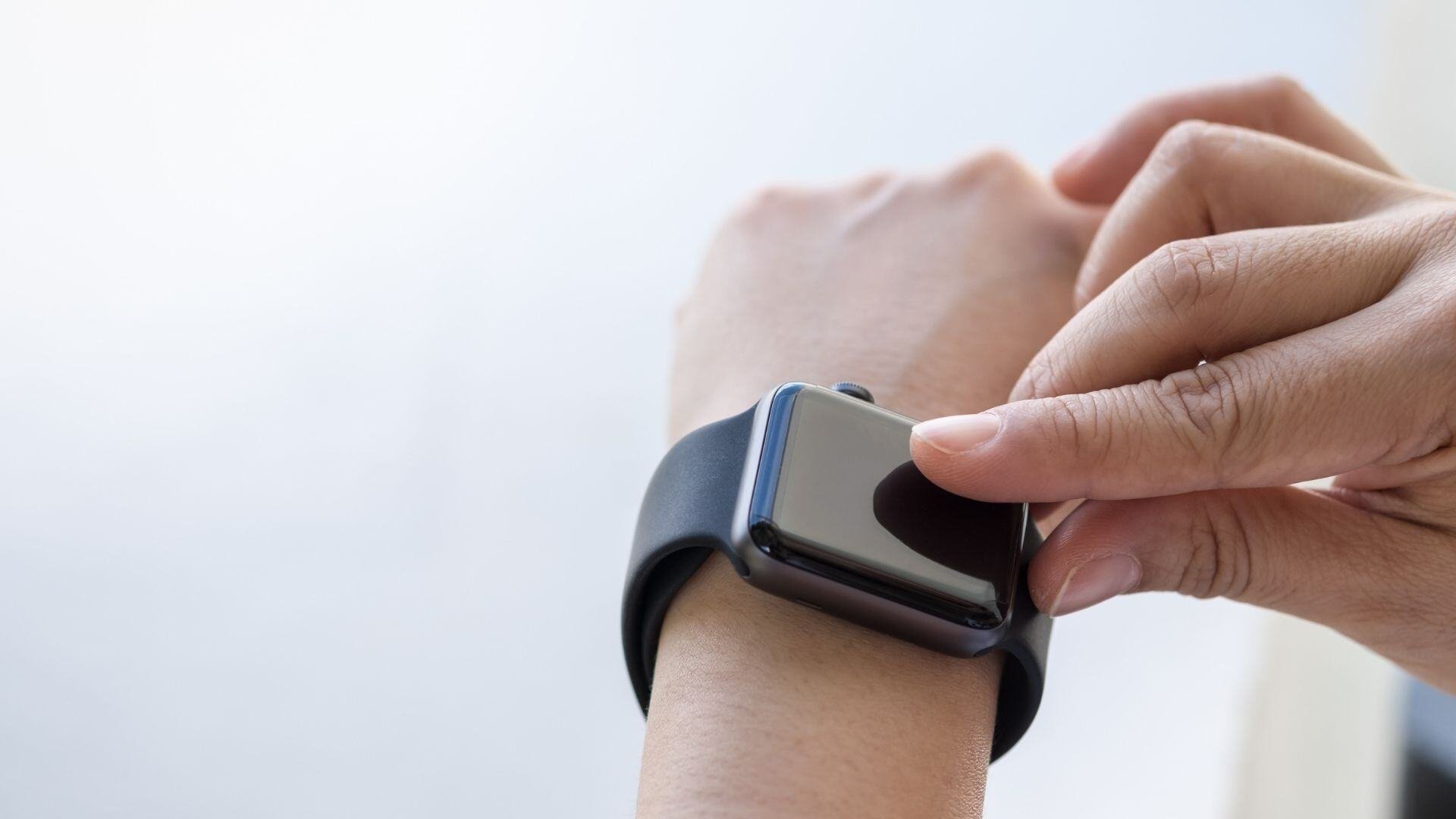 Electronics-close-up-woman-hands-wearing-using-smartwatch