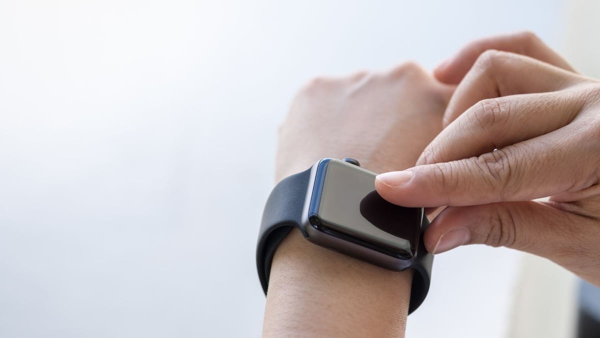 Electronics-close-up-woman-hands-wearing-using-smartwatch